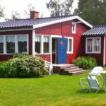 cottage with large terrace facing the lake